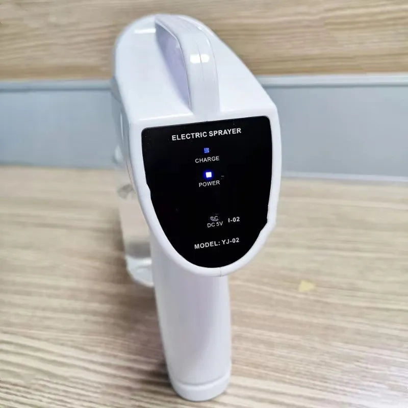 White handheld wireless electric spray disinfection gun with anti-blocking nozzle and USB-C charging port
