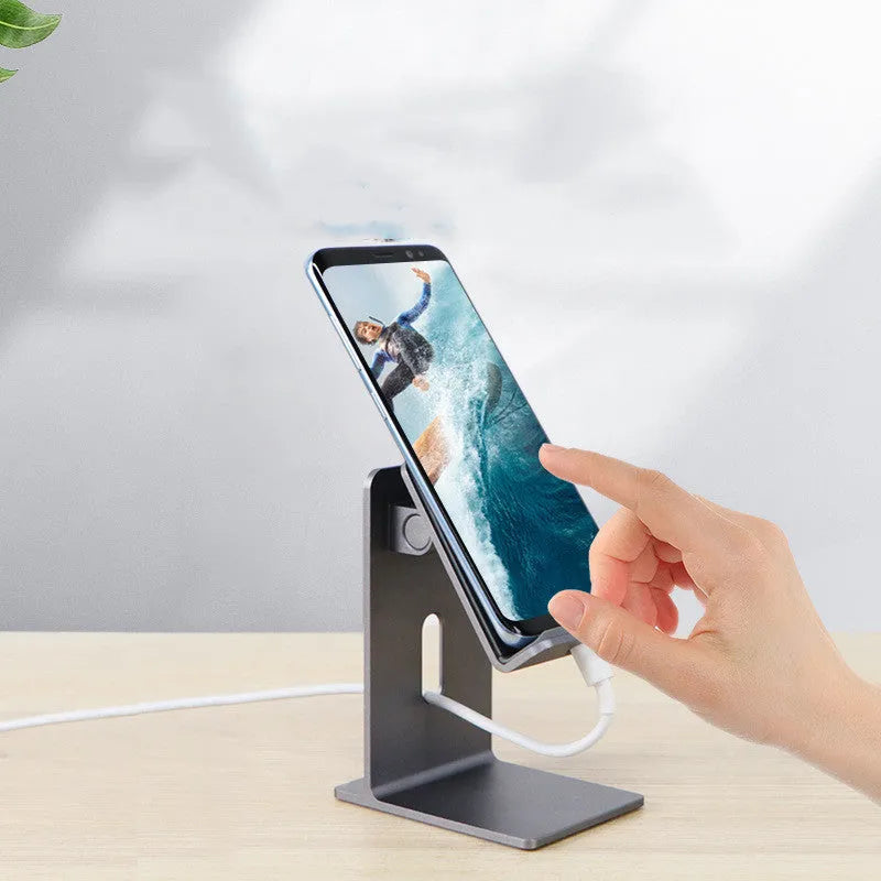 Alloy mobile phone holder in Dark Space Gray colour on a desktop