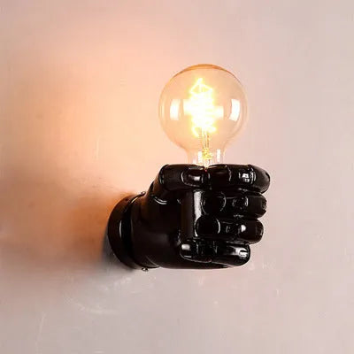 Creative resin wall lamp in shape of a fist, shown in black, white, and wood grain colour options.