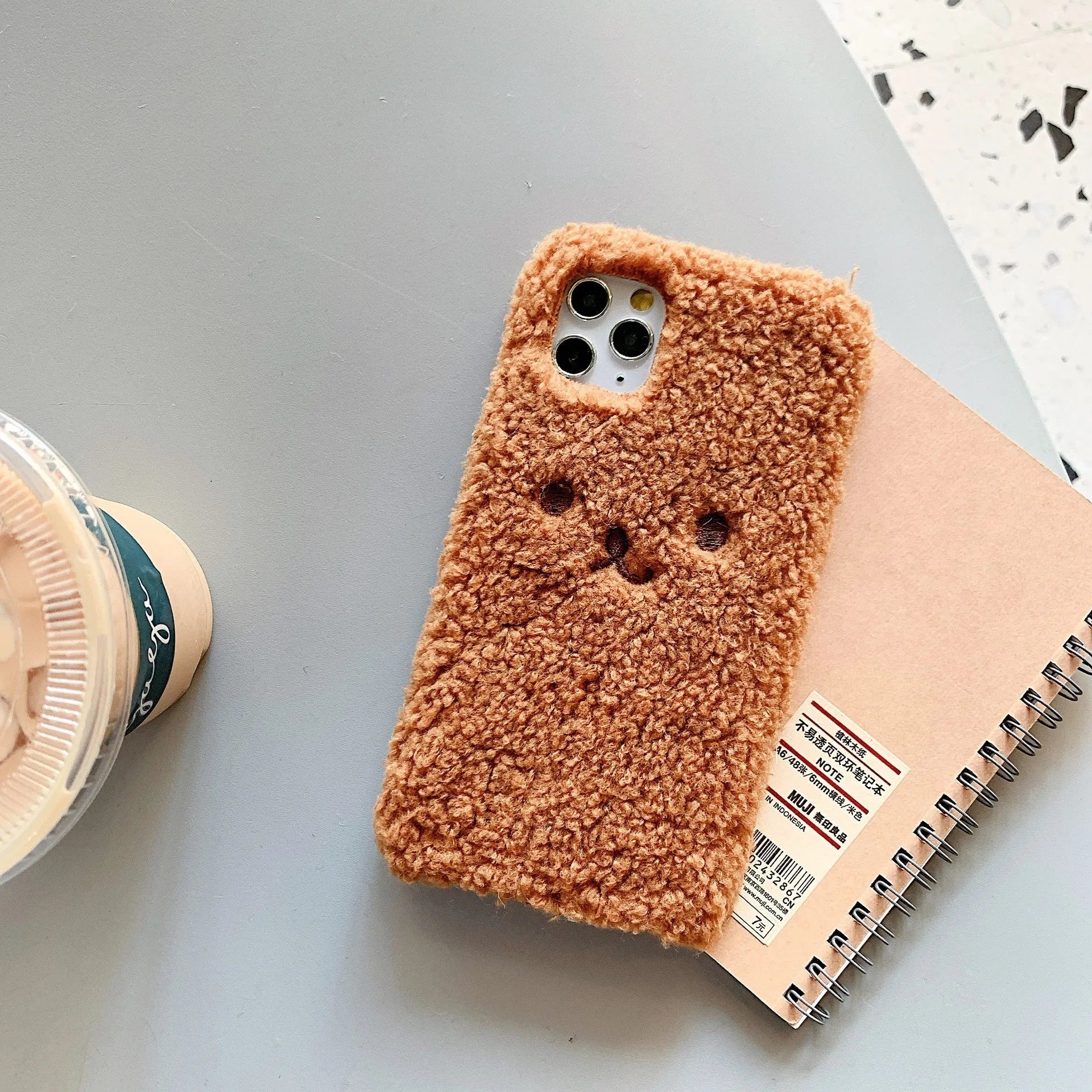 Brown embroidery plush cartoon bear face design on a TPU iPhone phone case