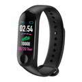 M3 smart bracelet with colour screen showing fitness stats, on a wrist with a black TPE strap.