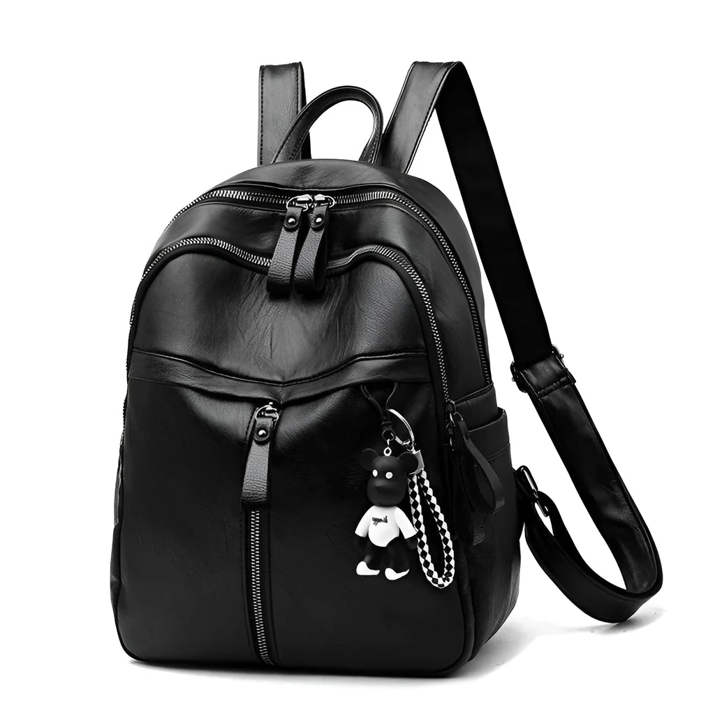 Black soft surface PU leather backpack showing medium size with shoulder straps and luggage strap attachment
