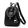 Black soft surface PU leather backpack showing medium size with shoulder straps and luggage strap attachment