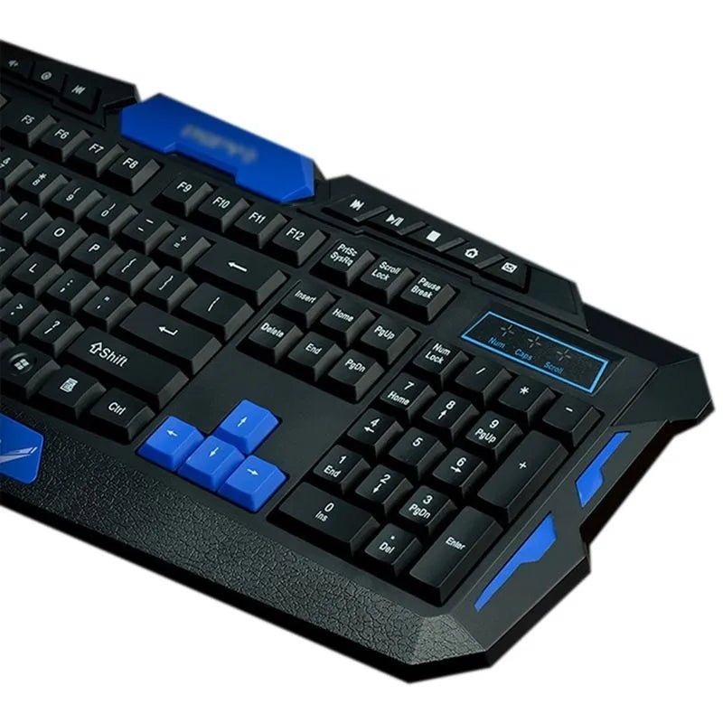 Black and blue wireless keyboard and mouse set on desk