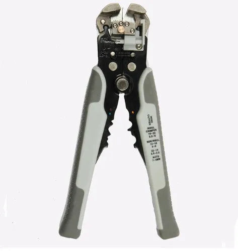 Yellow automatic 3-in-1 wire stripper and crimper tool for electrical cables on a workbench.