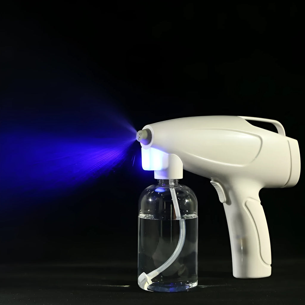 White handheld wireless electric spray disinfection gun with anti-blocking nozzle and USB-C charging port