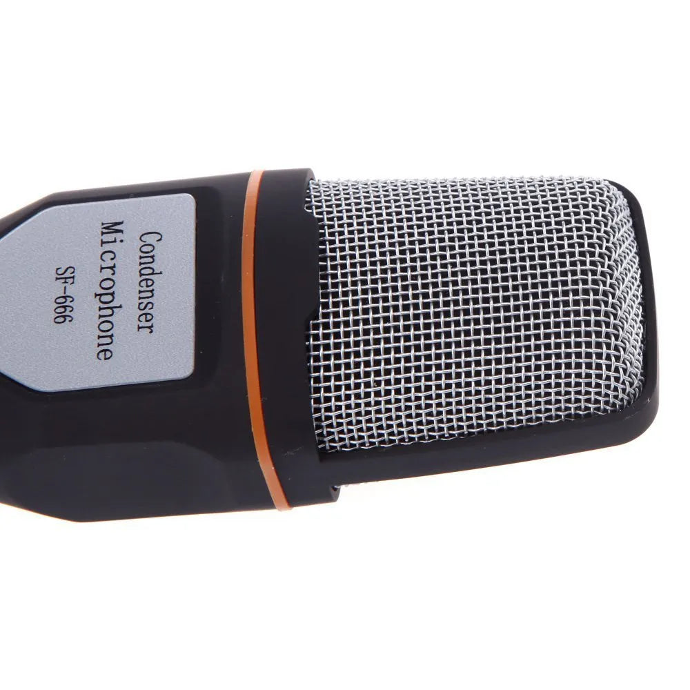 Black wired PC microphone with a metal clip-on holder and a long cable for desktop use.