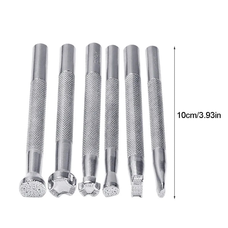 Set of six alloy leather carving printing sticks arranged on a workbench, tools for stamping and embossing