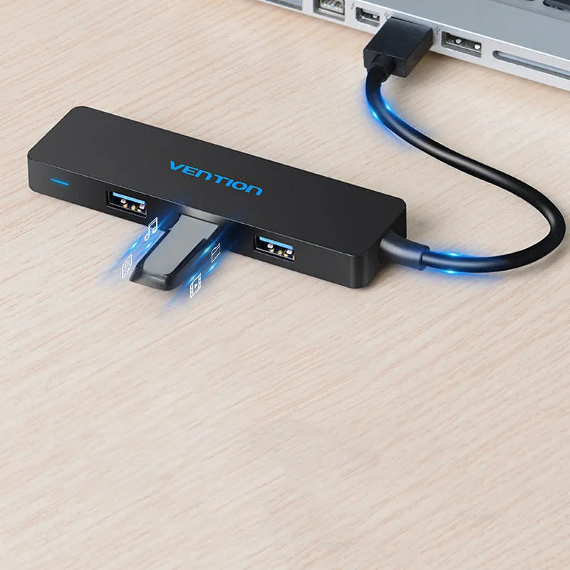Black USB 3.0 four-port hub with short cable and nickel-plated connectors