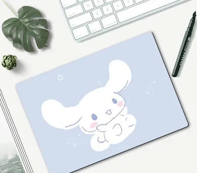 Cute cartoon character mouse pad with wrist support, measuring 260mm by 210mm, on a desk.