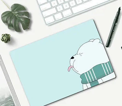 Cute cartoon character mouse pad with wrist support, measuring 260mm by 210mm, on a desk.
