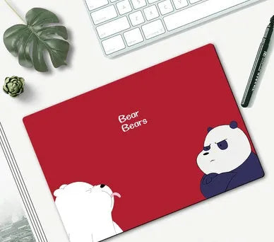 Cute cartoon character mouse pad with wrist support, measuring 260mm by 210mm, on a desk.