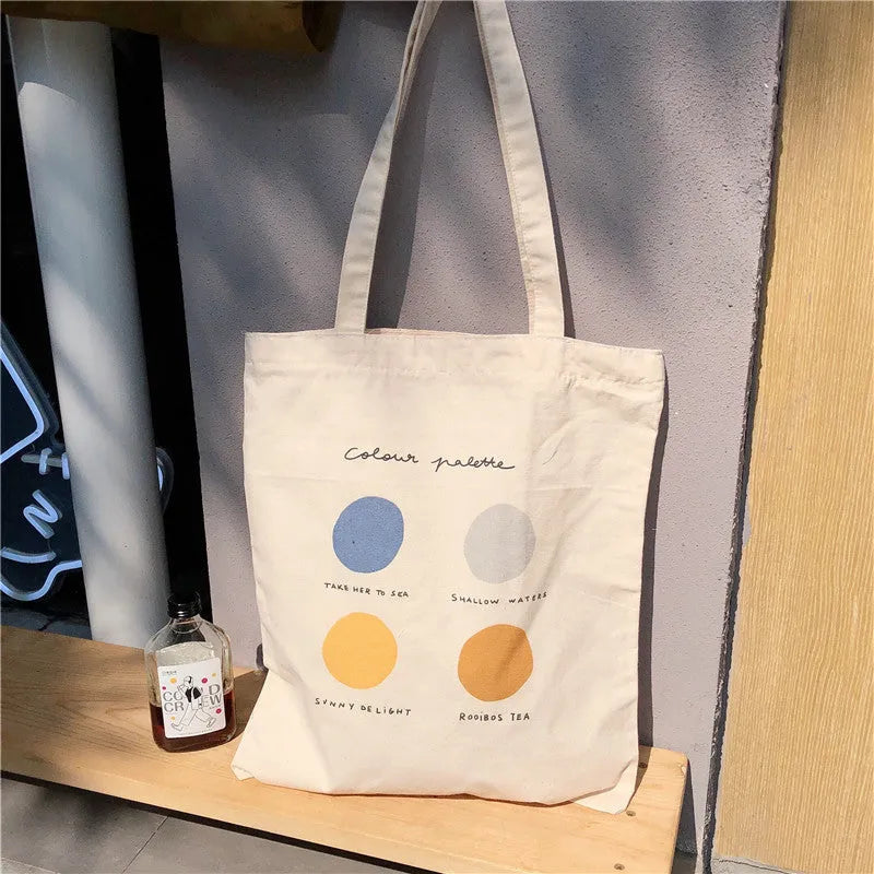Women's geometric pattern canvas tote shopper bag with zipper closure in orange colour.