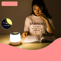 Pruixin rotating projector night light displaying star patterns on a bedroom wall.