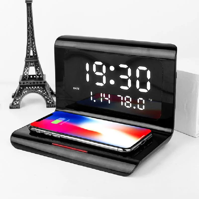 White wireless charger alarm clock displaying time, calendar, temperature and humidity with 10W charging capability