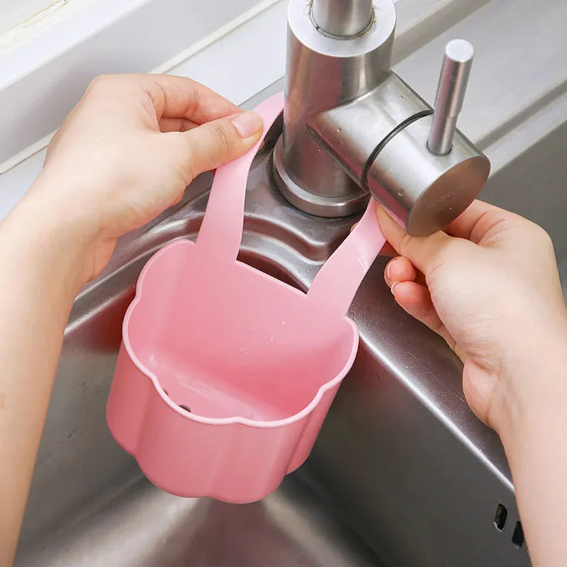 Plastic sink drain basket in dark blue colour showing 20cm length and 10cm width dimensions