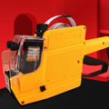 Blue handheld manual price labelling machine for supermarket bottles with ink roller and paper rolls.