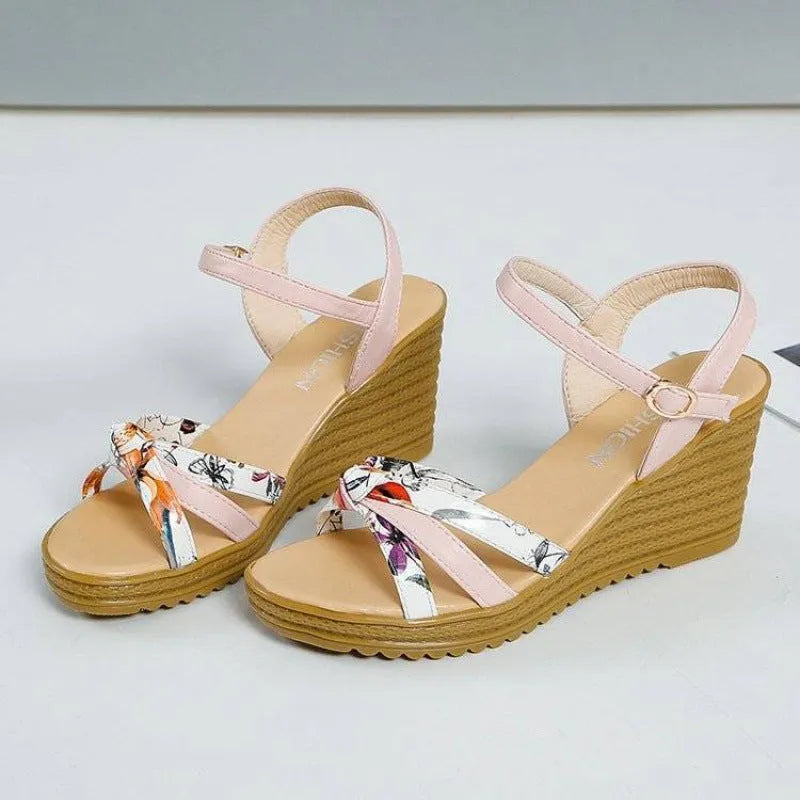 Women's pink wedge sandals with fish mouth design and thick non-slip heel on white background.