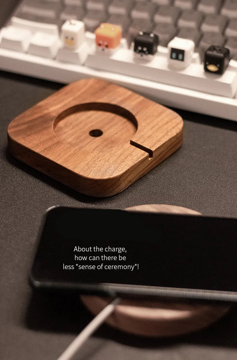 Walnut wood MagSafe wireless charging bracket stand for iPhone on a desk