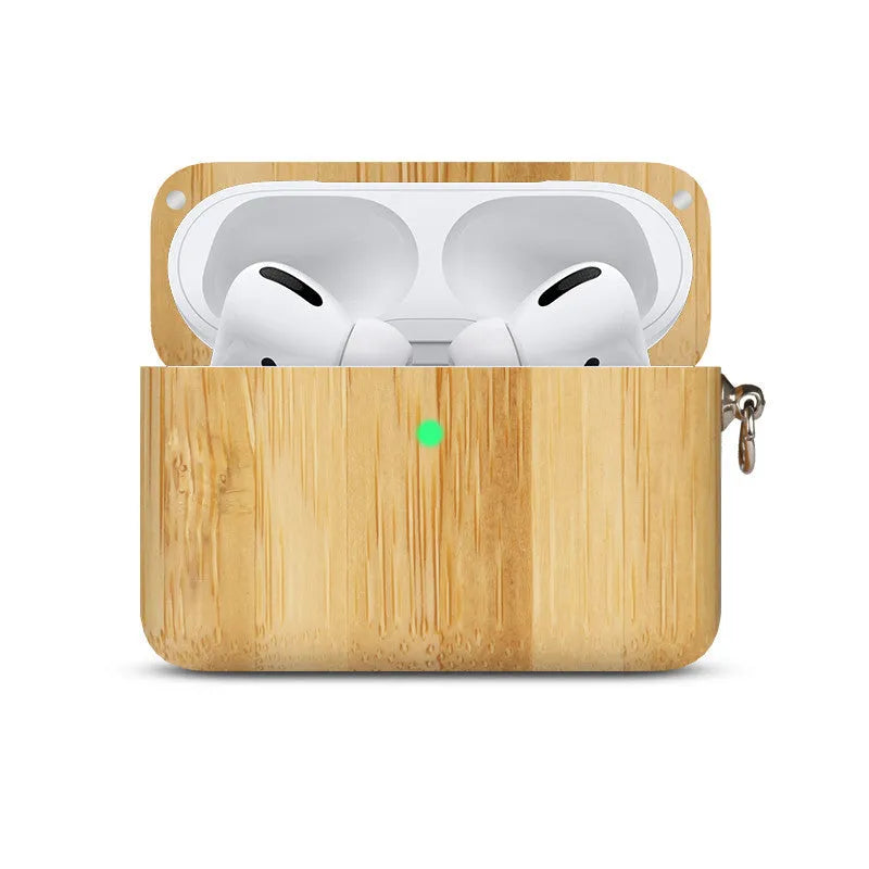 Hardwood Bluetooth earphone sleeve in a choice of wood types next to wireless earphones.