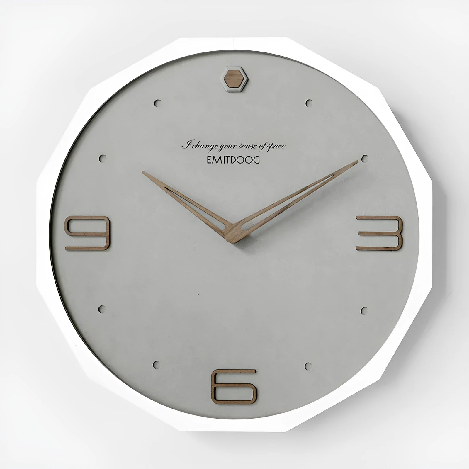 Nordic style round 12 inch wall clock with perforated pattern in neutral colours