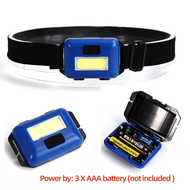 Compact blue, black, or red LED headlamp with a polyester head strap, showing 3W COB bulb.
