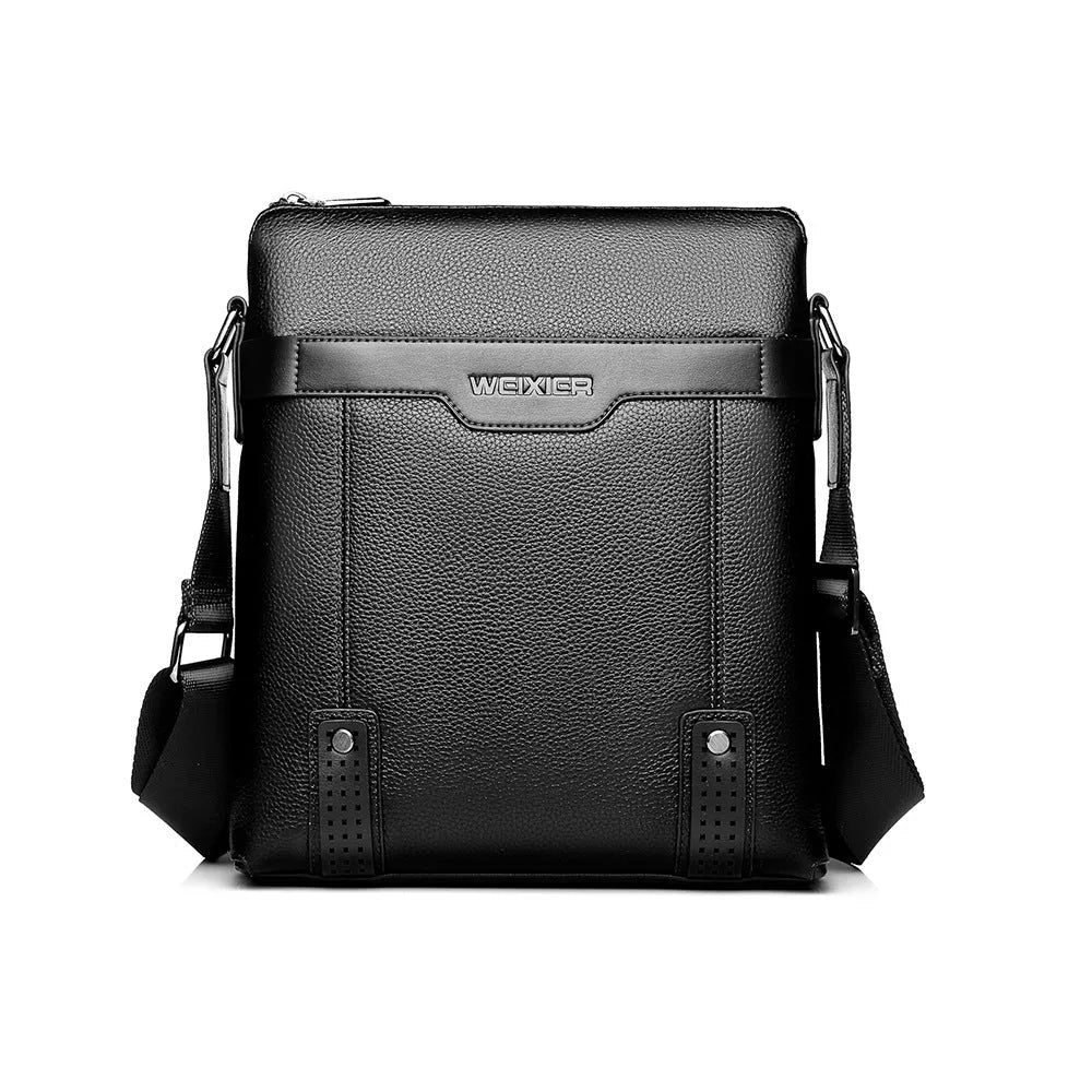 Medium square vertical PU leather shoulder bag in black with single strap and zipper closure