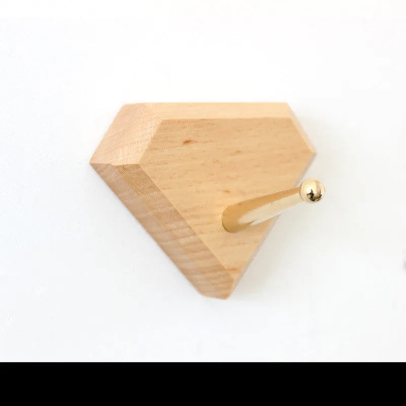 Beech wood adhesive wall hook with brass component in five shapes supporting 10kg load