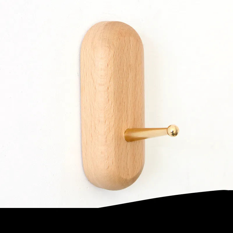 Beech wood adhesive wall hook with brass component in five shapes supporting 10kg load