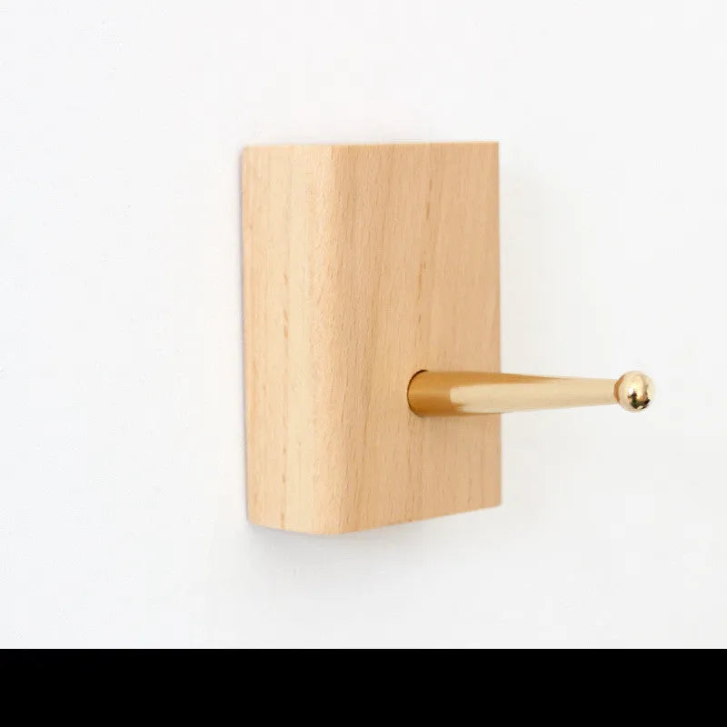 Beech wood adhesive wall hook with brass component in five shapes supporting 10kg load