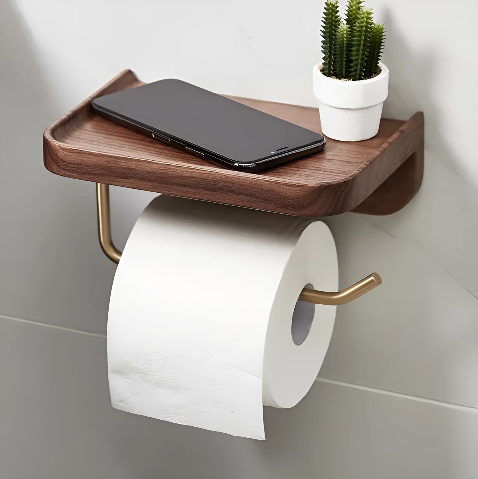 Solid walnut wood wall-mounted paper towel and toilet roll holder with brass fittings.