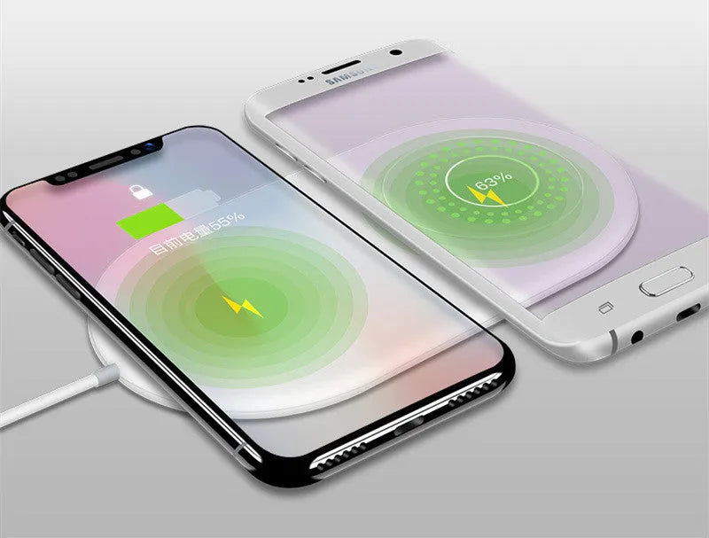 White dual wireless charging station for two mobile phones with fast charging support