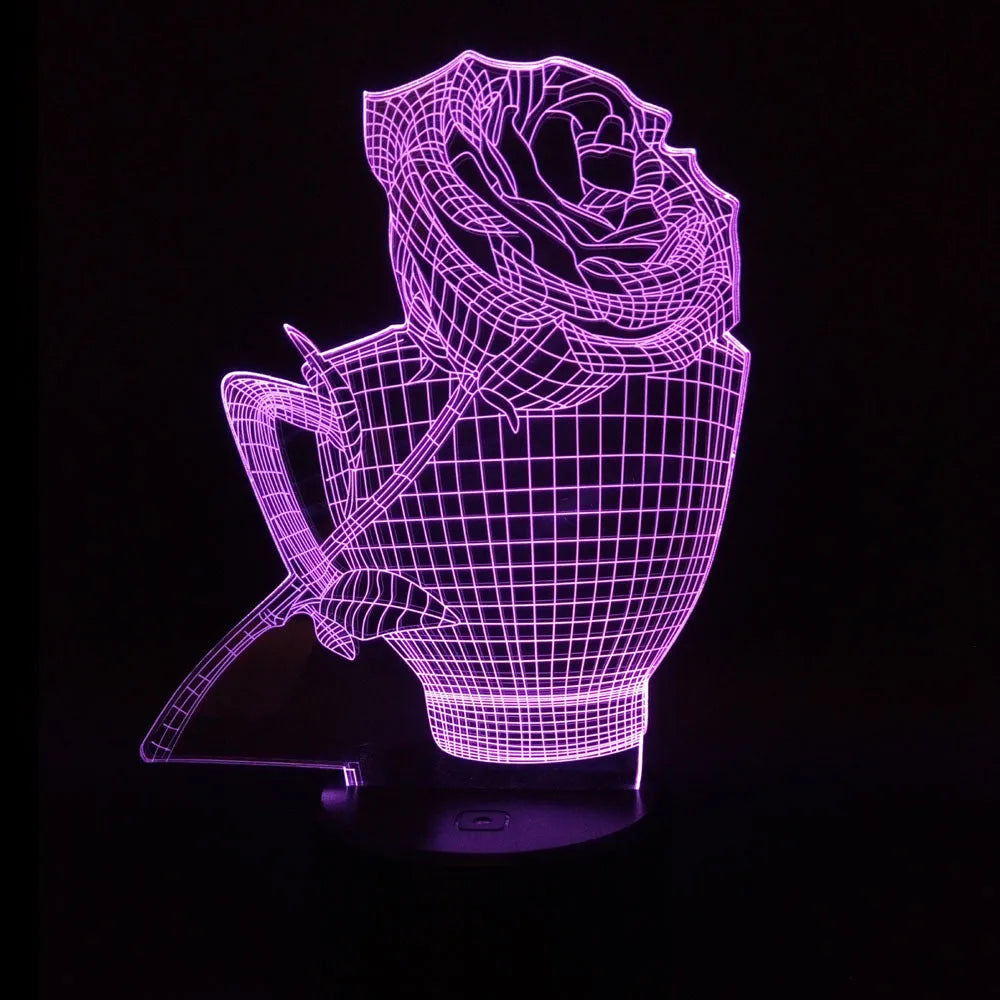 A 3D acrylic rose LED night light with a black base, displaying a purple glow, sitting on a wooden surface.
