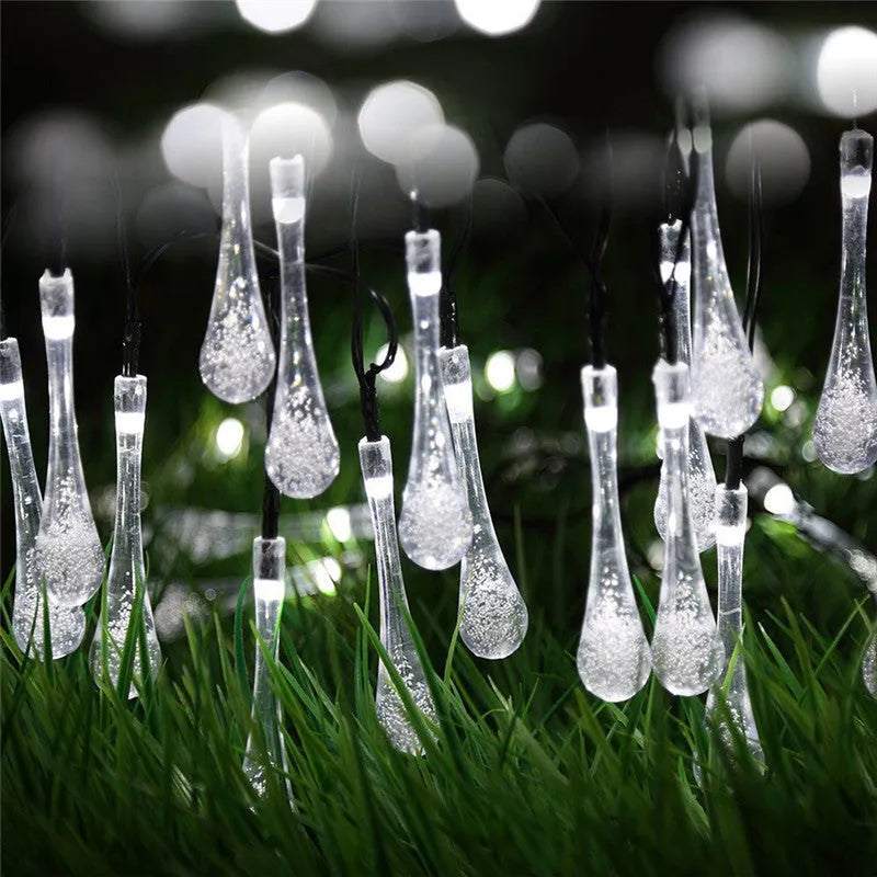 Solar-powered outdoor LED string lights with water drop pendants on 6.5 metre cable