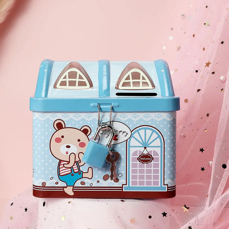 Blue house-shaped tinplate piggy bank with coin slot on roof