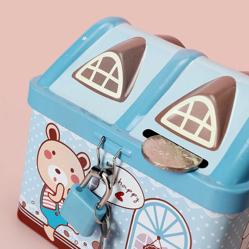 Blue house-shaped tinplate piggy bank with coin slot on roof