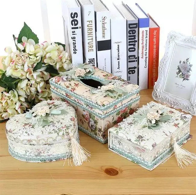 Ceramic jewellery storage box with integrated tissue dispenser in bright apricot colour