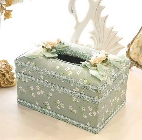 Ceramic jewellery storage box with integrated tissue dispenser in bright apricot colour