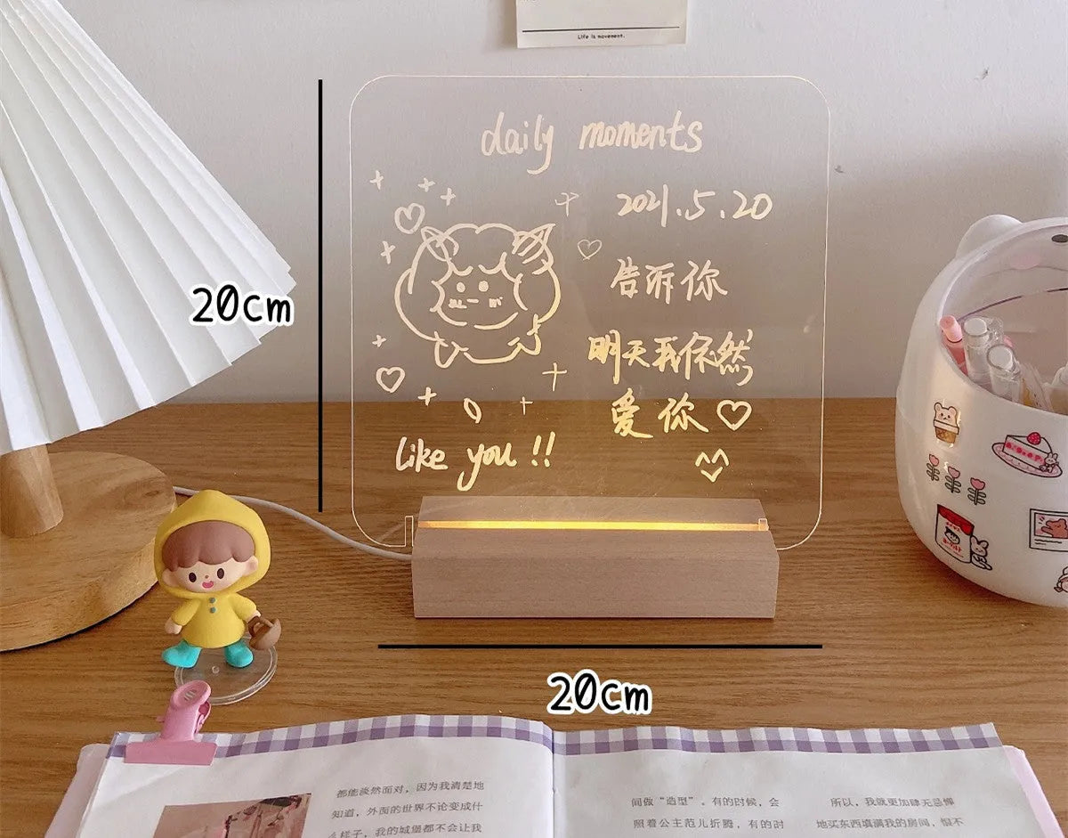 LED bedside night light with an optional erasable message board on a nightstand.
