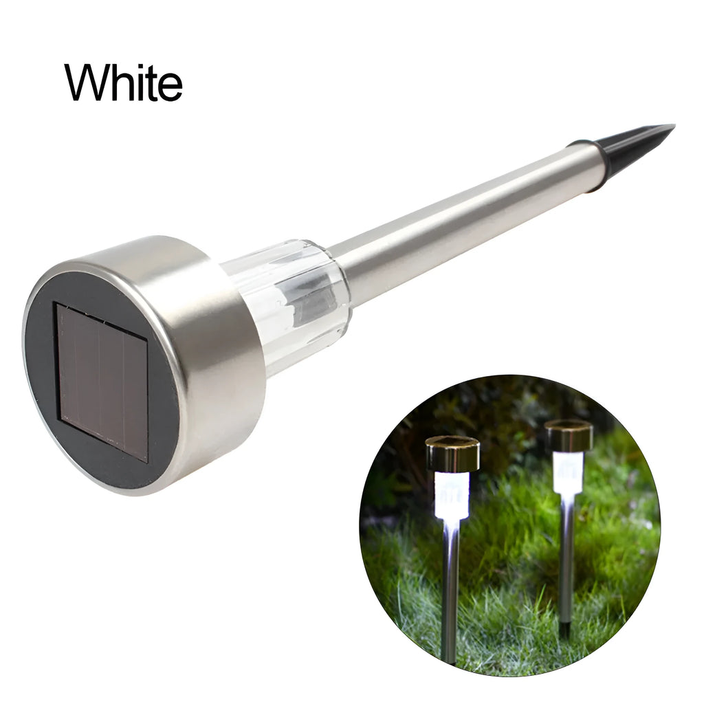 Stainless steel pastoral-style garden LED light placed outdoors on grass.