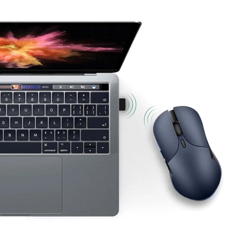Blue smart voice translation wireless mouse with USB receiver on a desk