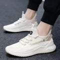 Men's white low-top sports shoes with mesh upper and rubber sole on neutral background