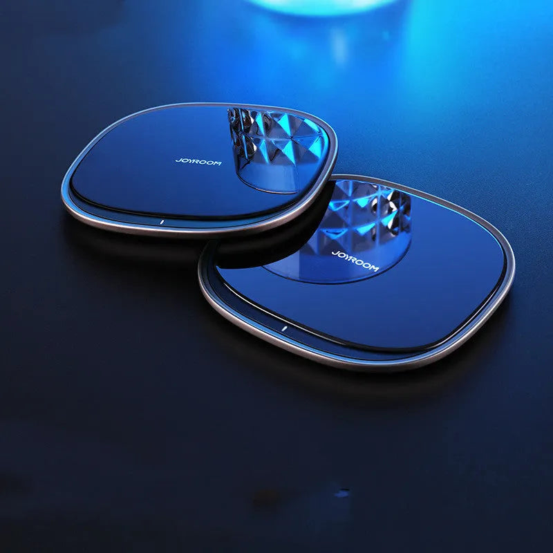 Square black or white 15W wireless phone charger with a glass top and zinc alloy body.
