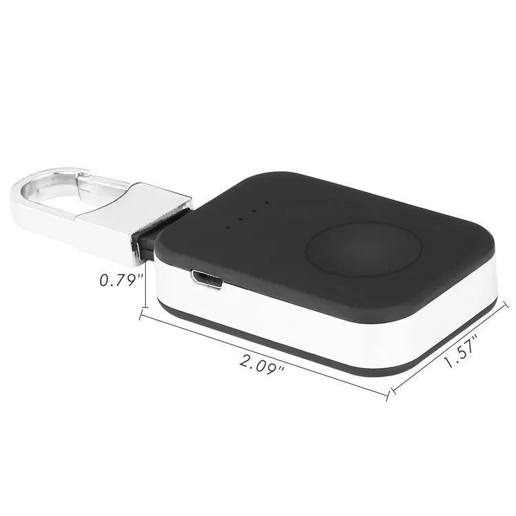 Black Apple Watch portable wireless power bank on a keyring showing compact size