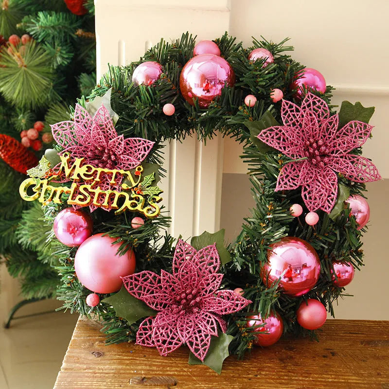 Multicolour plastic Christmas wreath with a 30cm diameter, hung on a door.