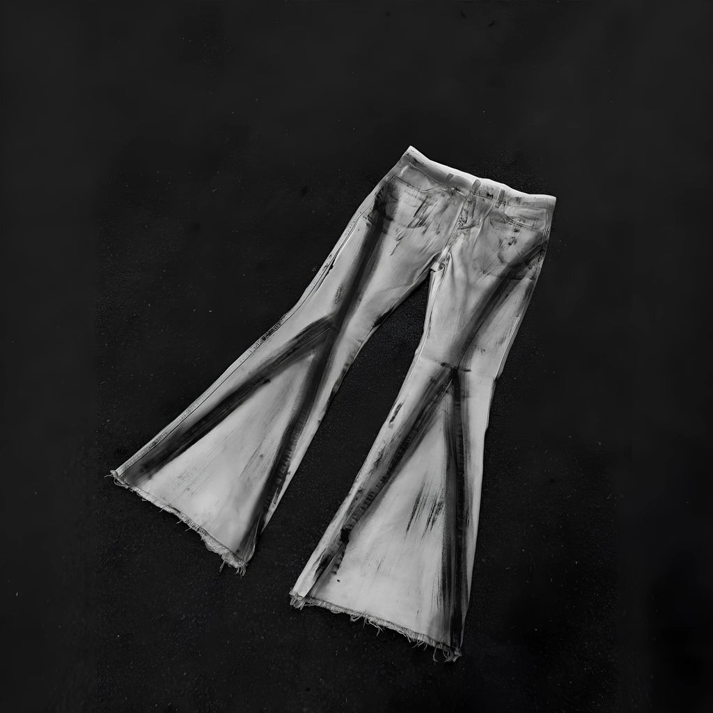 White denim jeans with a black ribbon gradient detail, showing a mid-waist fit and zip fly.