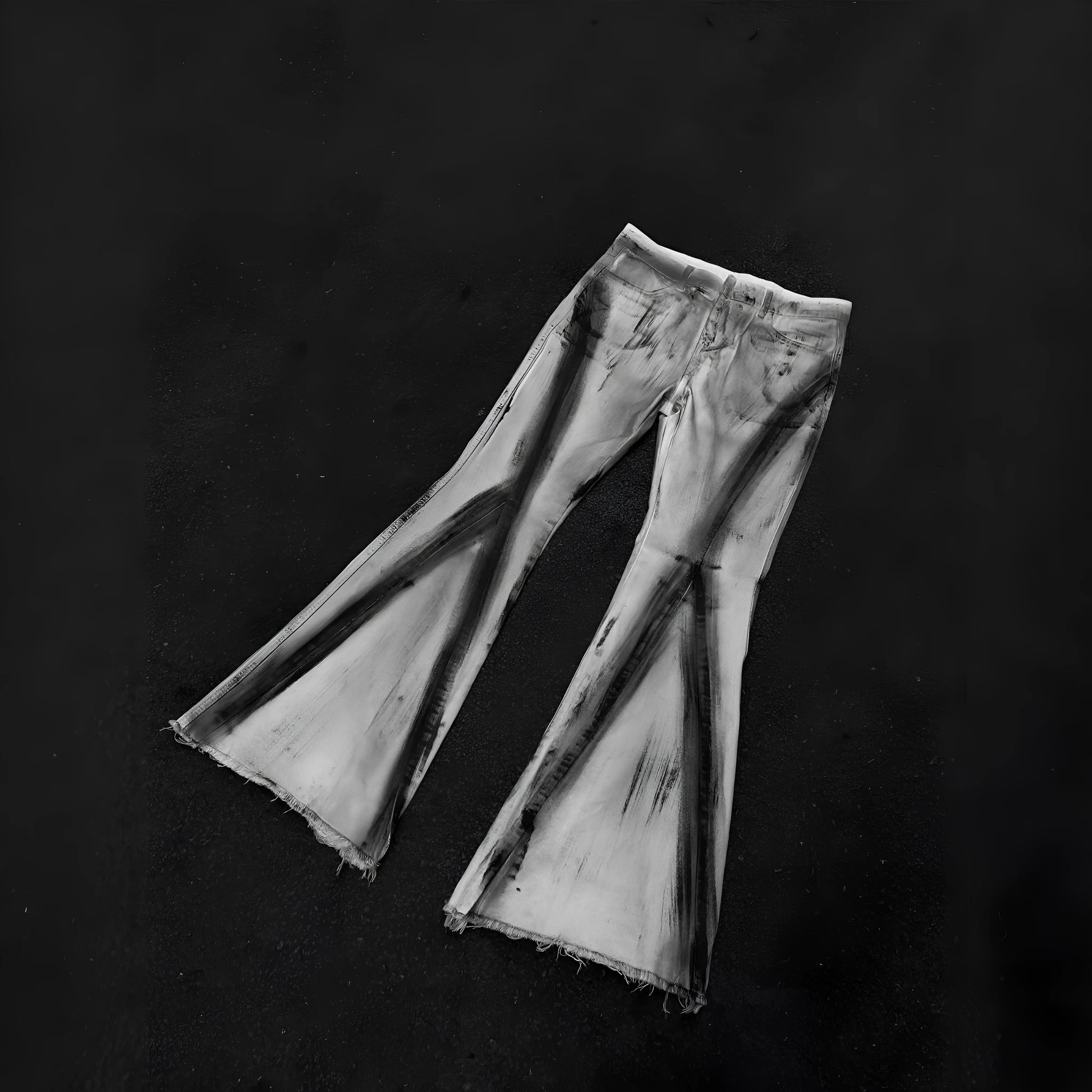 White denim jeans with a black ribbon gradient detail, showing a mid-waist fit and zip fly.