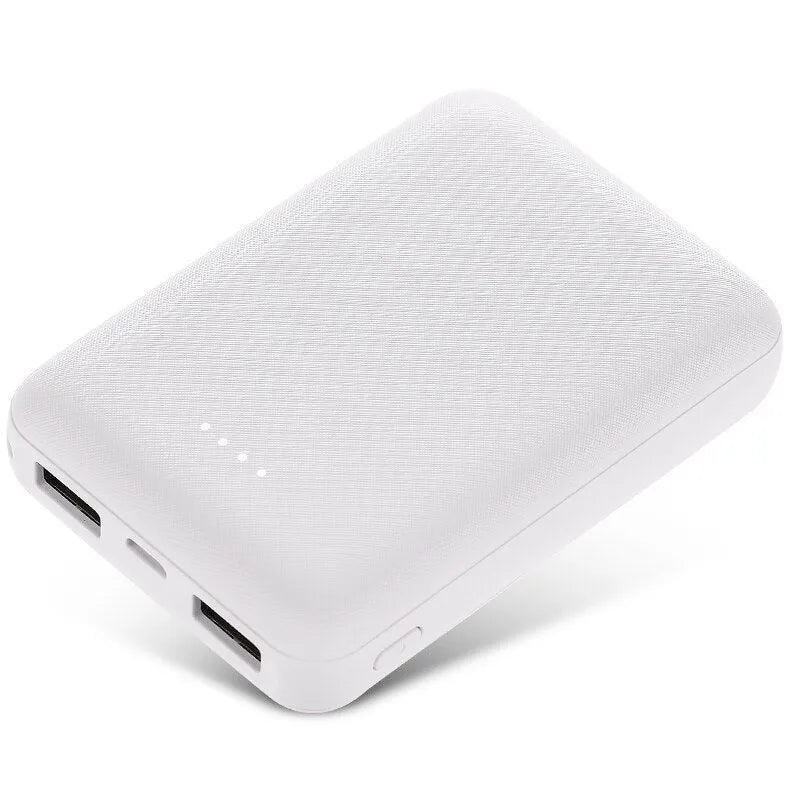 Black and white ultra-thin 10000mAh power bank showing multiple USB ports and compact 90x63x22mm dimensions