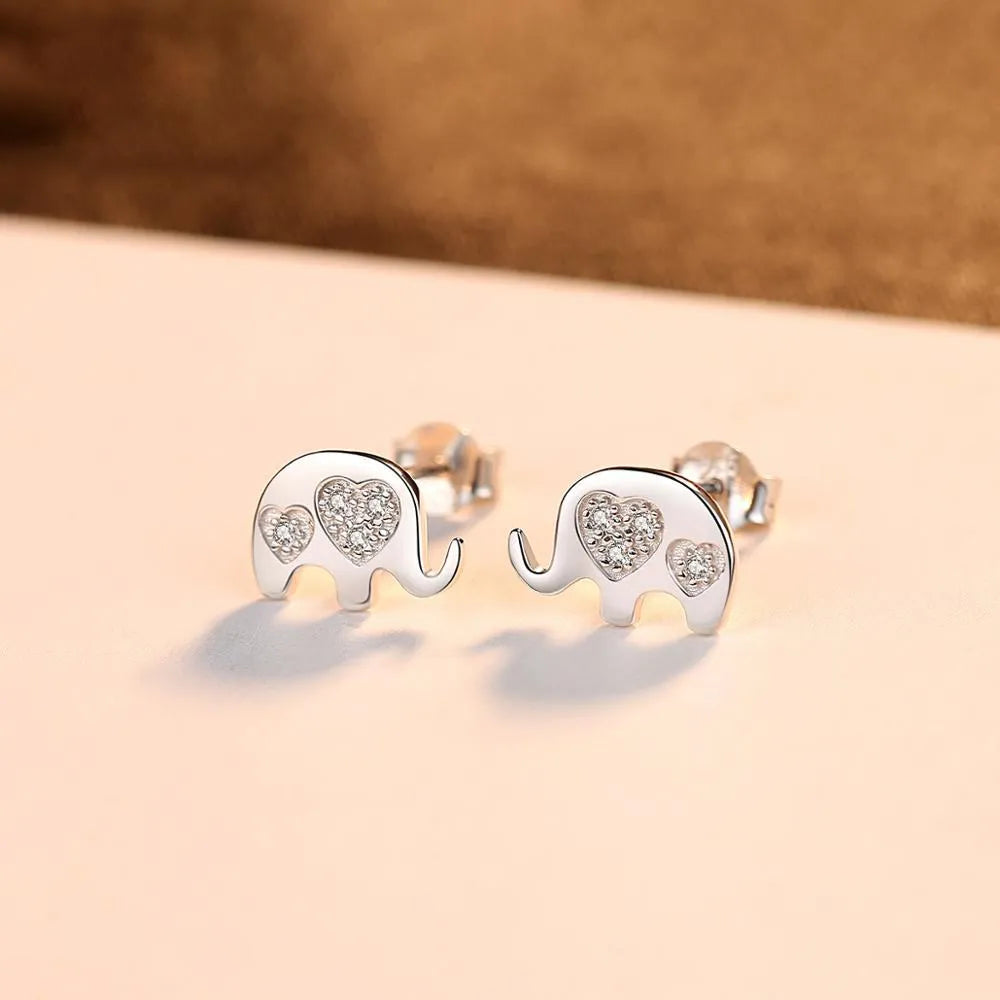 Small geometric drop earrings with gem setting in gold and silver colours
