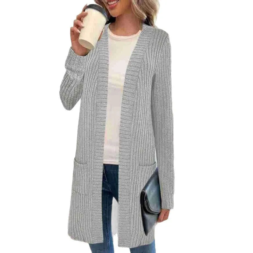 A loose-fitting long sleeve knitted cardigan jacket for plus sizes, shown in black, gray, or wine red.
